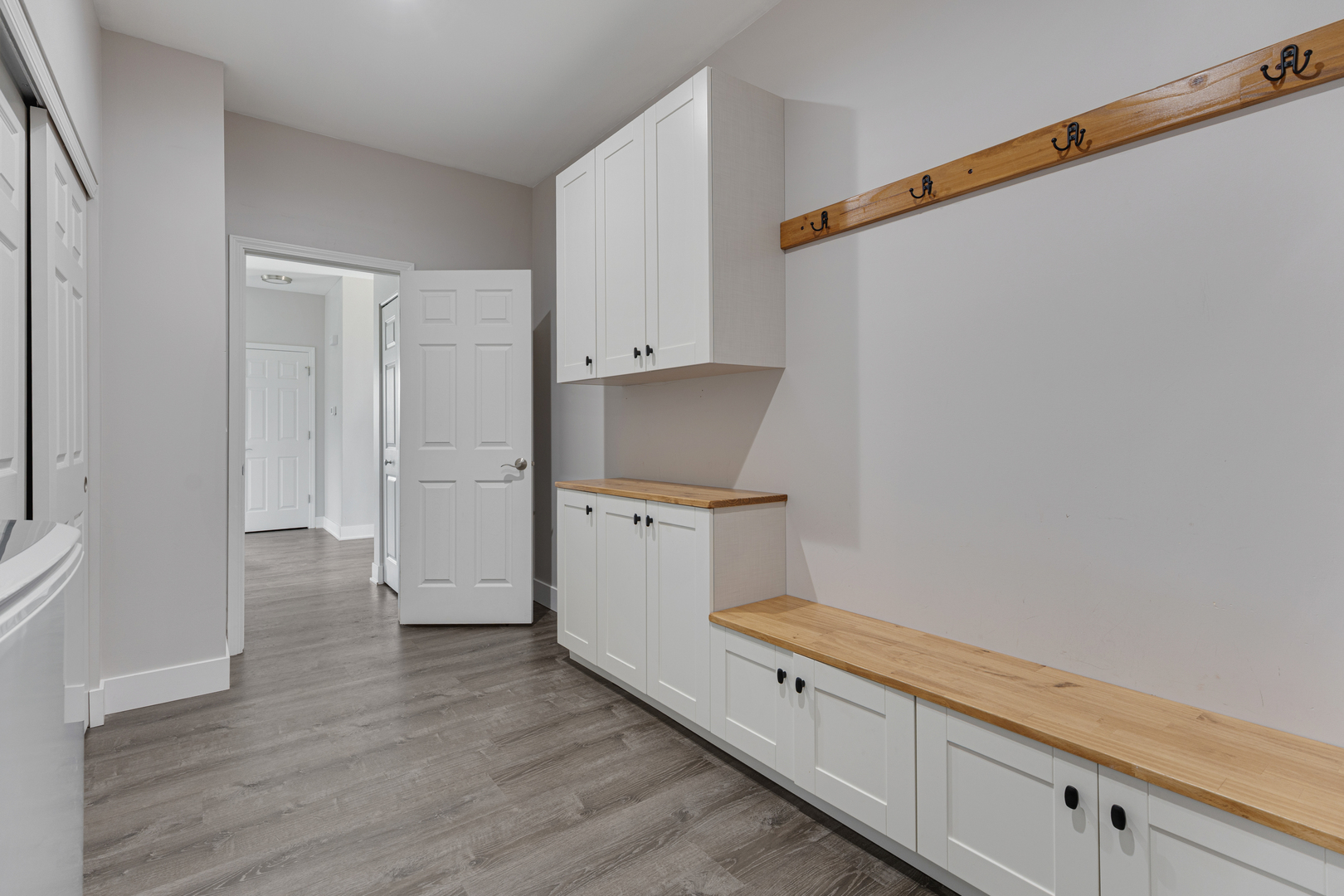 2751 Cedar Creek Cutoff Road Wauconda, IL 60084 - Photo 15 of 34 a view of a storage and utility room with wooden floor