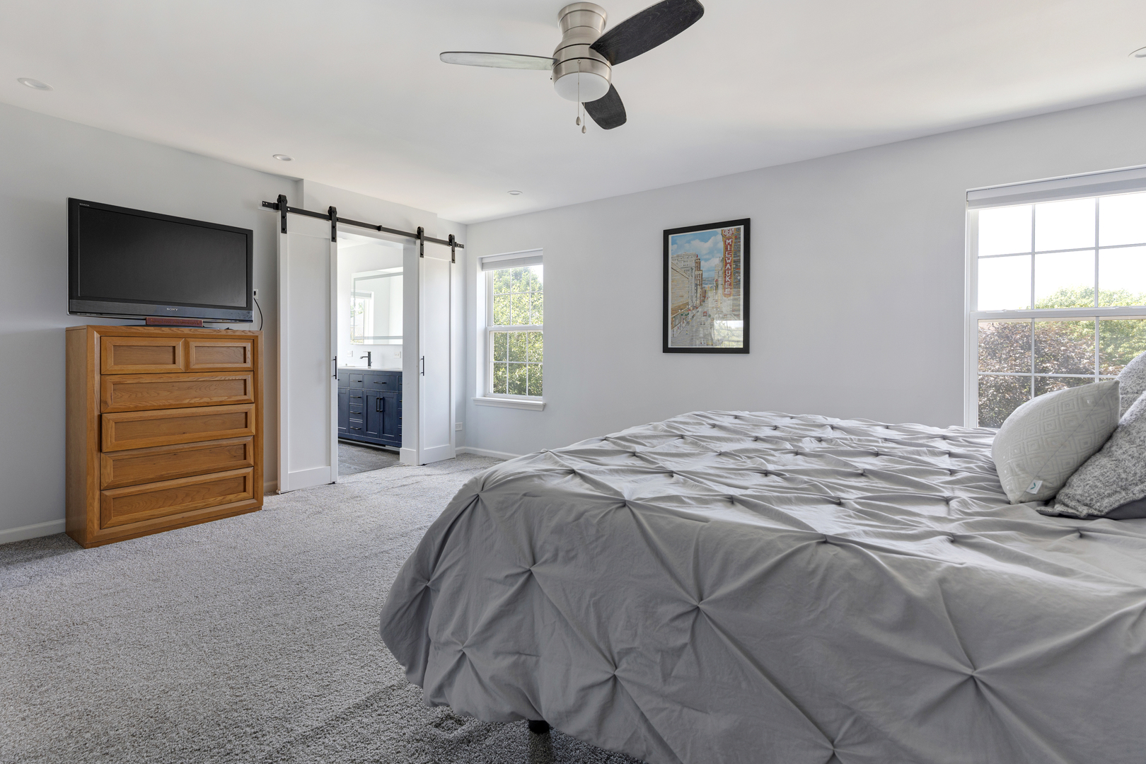 2751 Cedar Creek Cutoff Road Wauconda, IL 60084 - Photo 21 of 34 a bedroom with a bed and a television