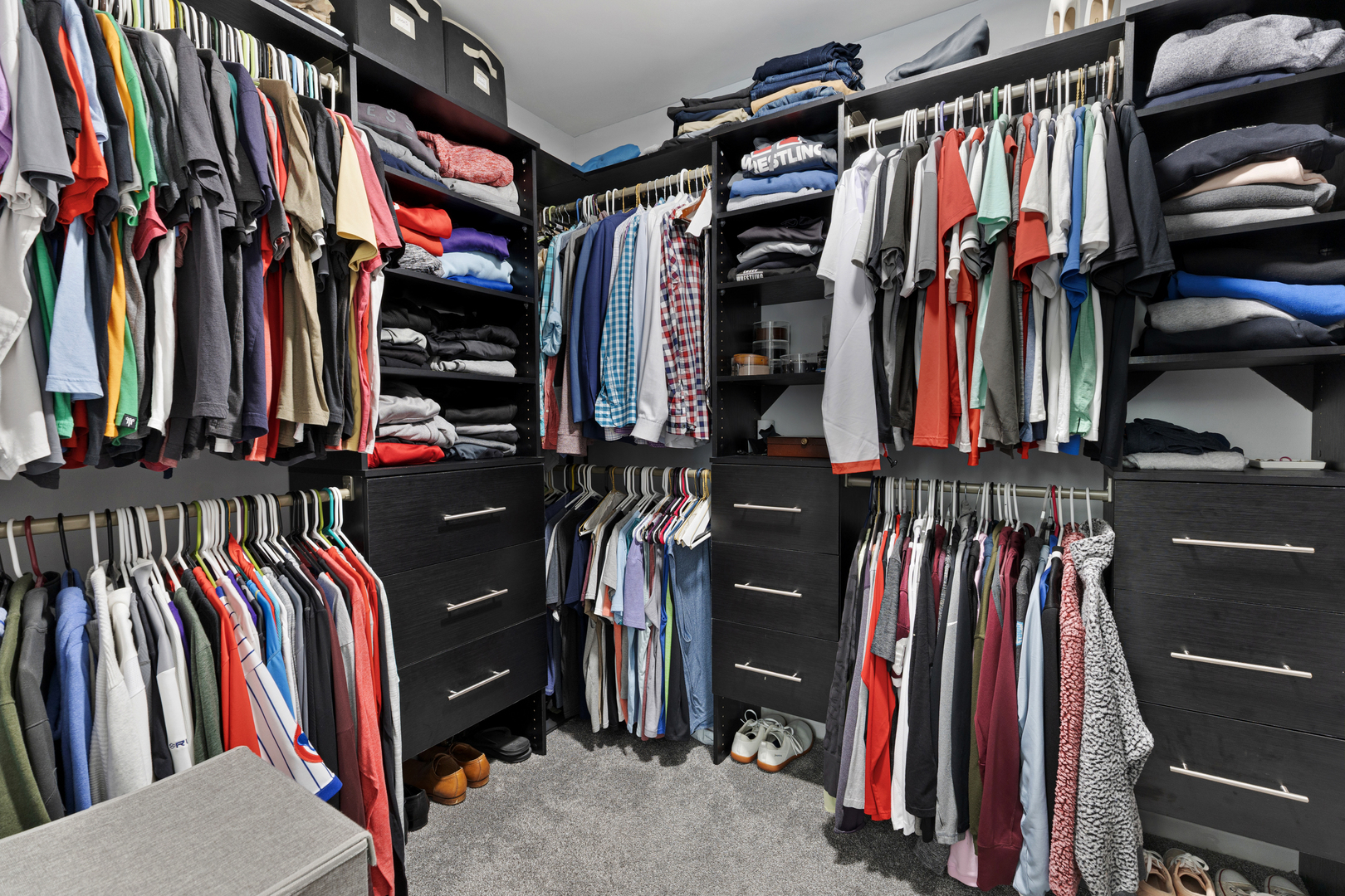 2751 Cedar Creek Cutoff Road Wauconda, IL 60084 - Photo 24 of 34 a view of walk in closet with clothes and shoes