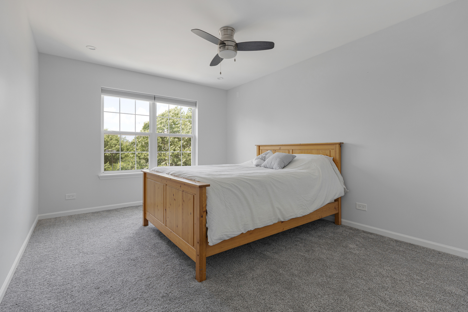 2751 Cedar Creek Cutoff Road Wauconda, IL 60084 - Photo 25 of 34 a bedroom with a bed and window