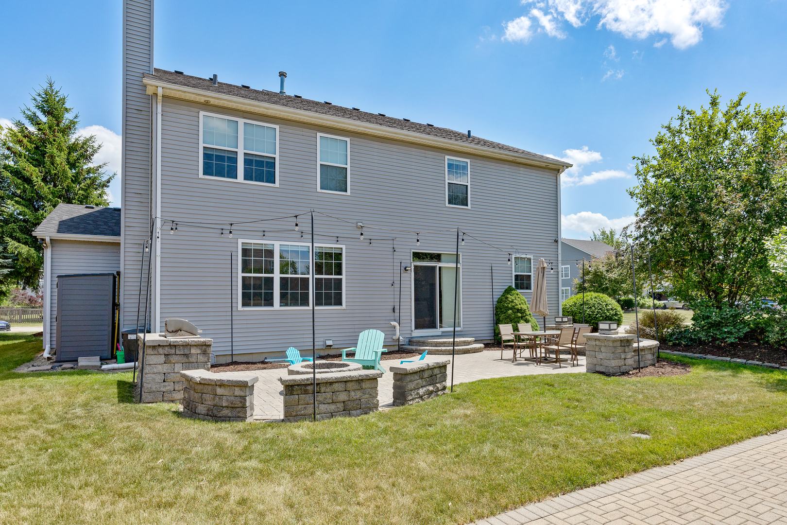 2751 Cedar Creek Cutoff Road Wauconda, IL 60084 - Photo 29 of 34 a view of a house with swimming pool and sitting area