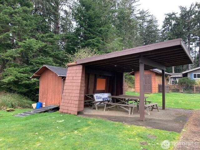 2004 195th Street Long Beach, WA 98631 - Photo 33 of 34 a view of a backyard with a sitting area and furniture