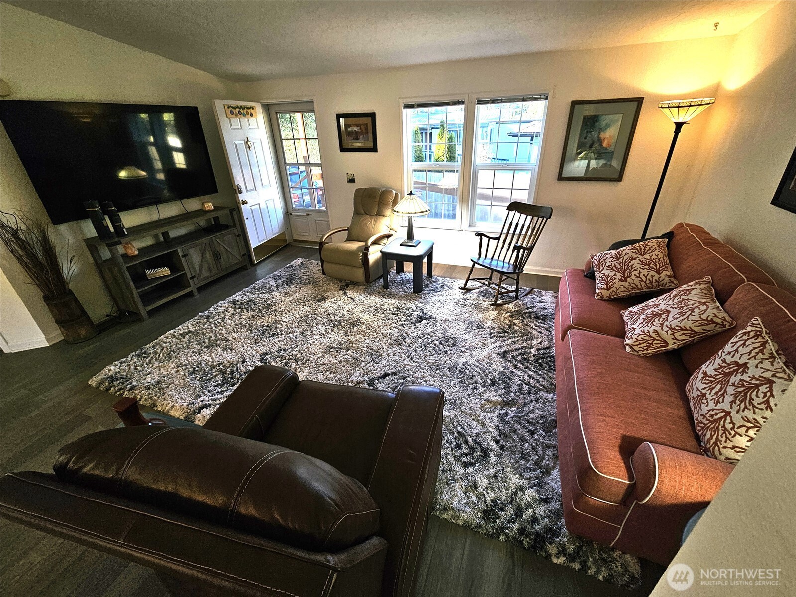 2004 195th Street Long Beach, WA 98631 - Photo 9 of 34 a living room with furniture and a flat screen tv