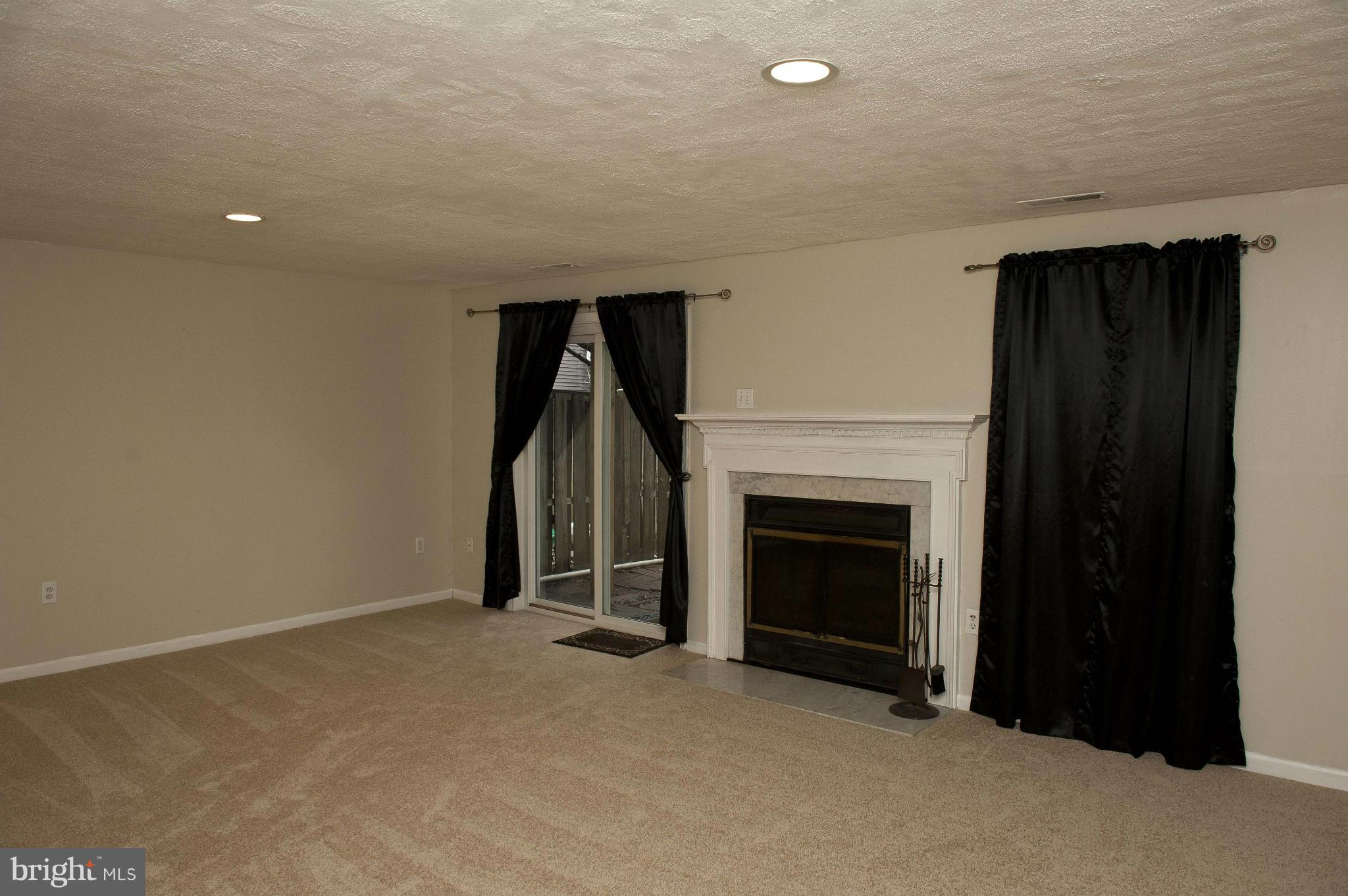 13232 Country Ridge Drive Germantown, MD 20874 - Photo 27 of 30 a view of empty room with fireplace