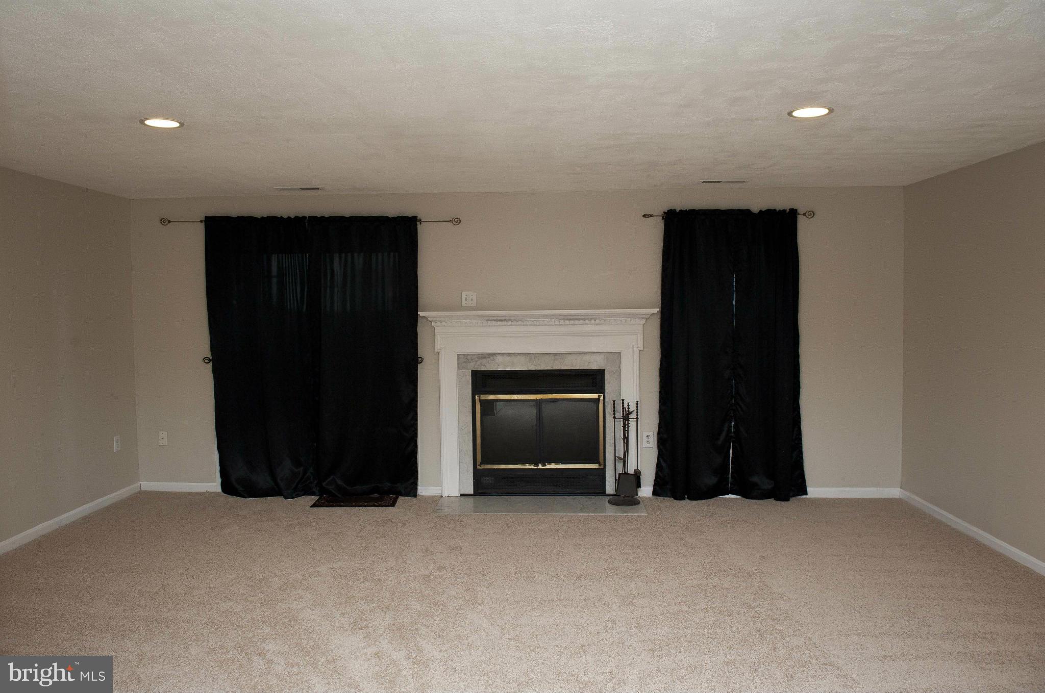 13232 Country Ridge Drive Germantown, MD 20874 - Photo 28 of 30 a view of an empty room and fire place
