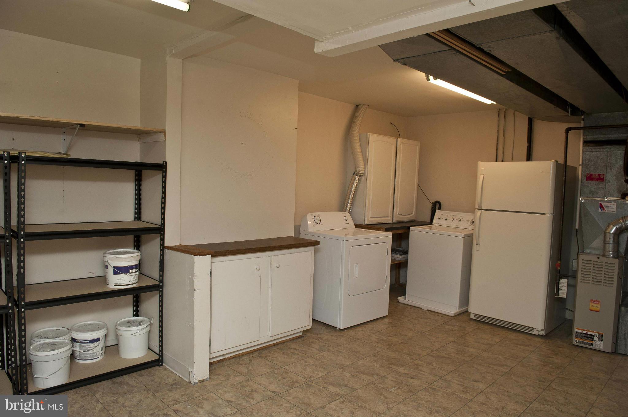 13232 Country Ridge Drive Germantown, MD 20874 - Photo 30 of 30 a utility room with dryer and washer