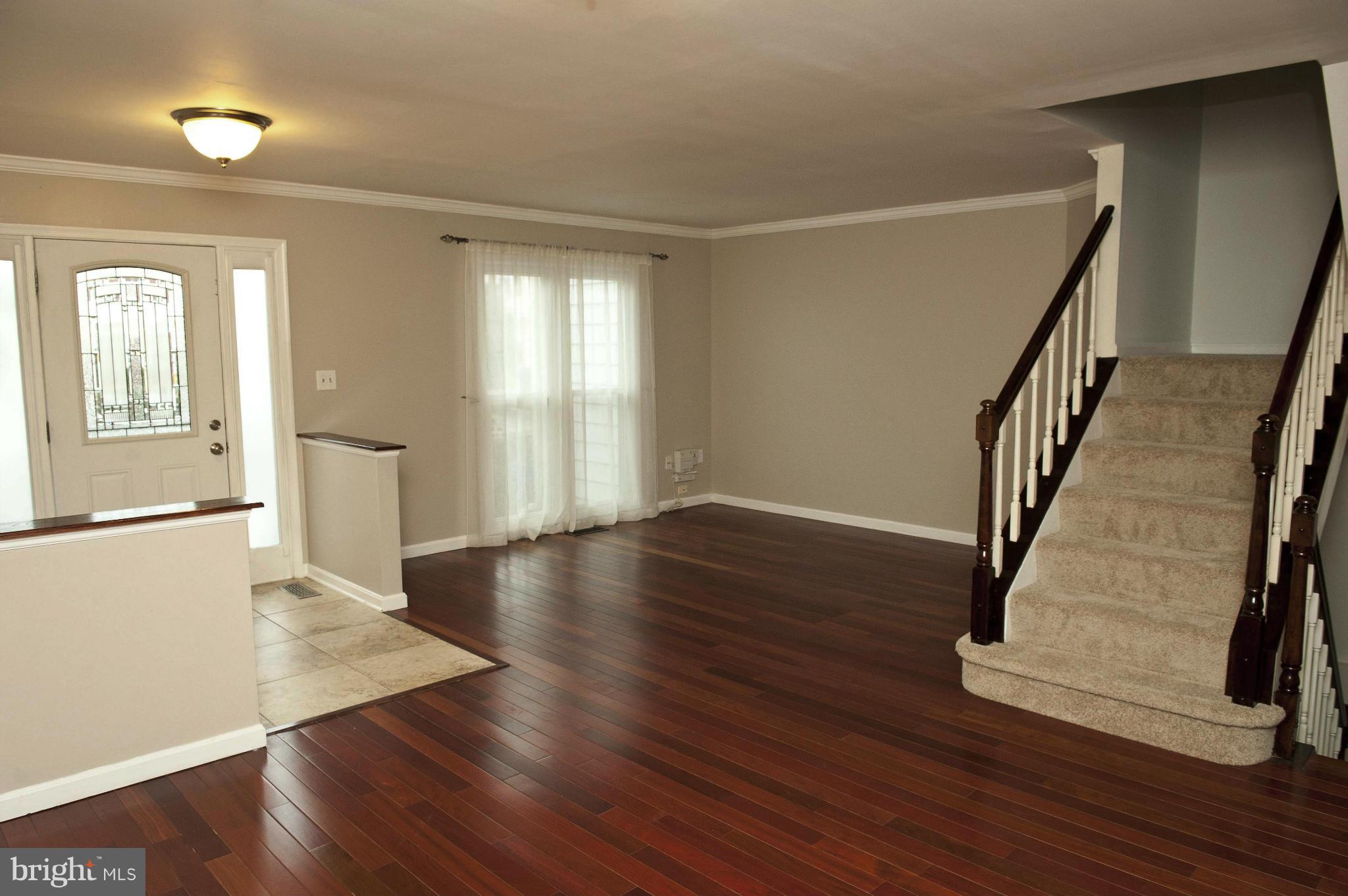 13232 Country Ridge Drive Germantown, MD 20874 - Photo 10 of 30 a view of entryway with wooden floor