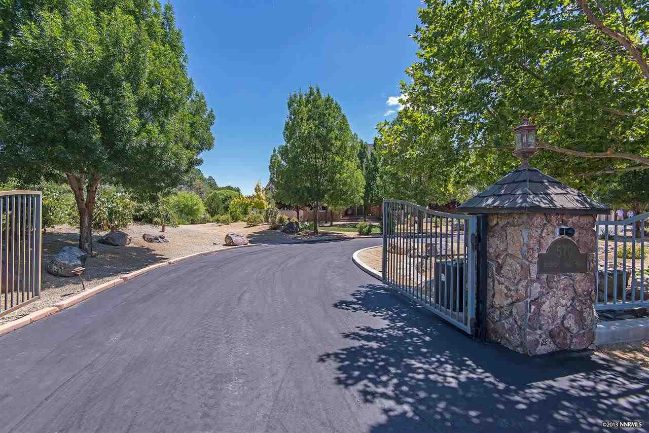 570 Juniper Hill Road Reno, NV 89519 - Photo 1 of 1 a view of street along with trees
