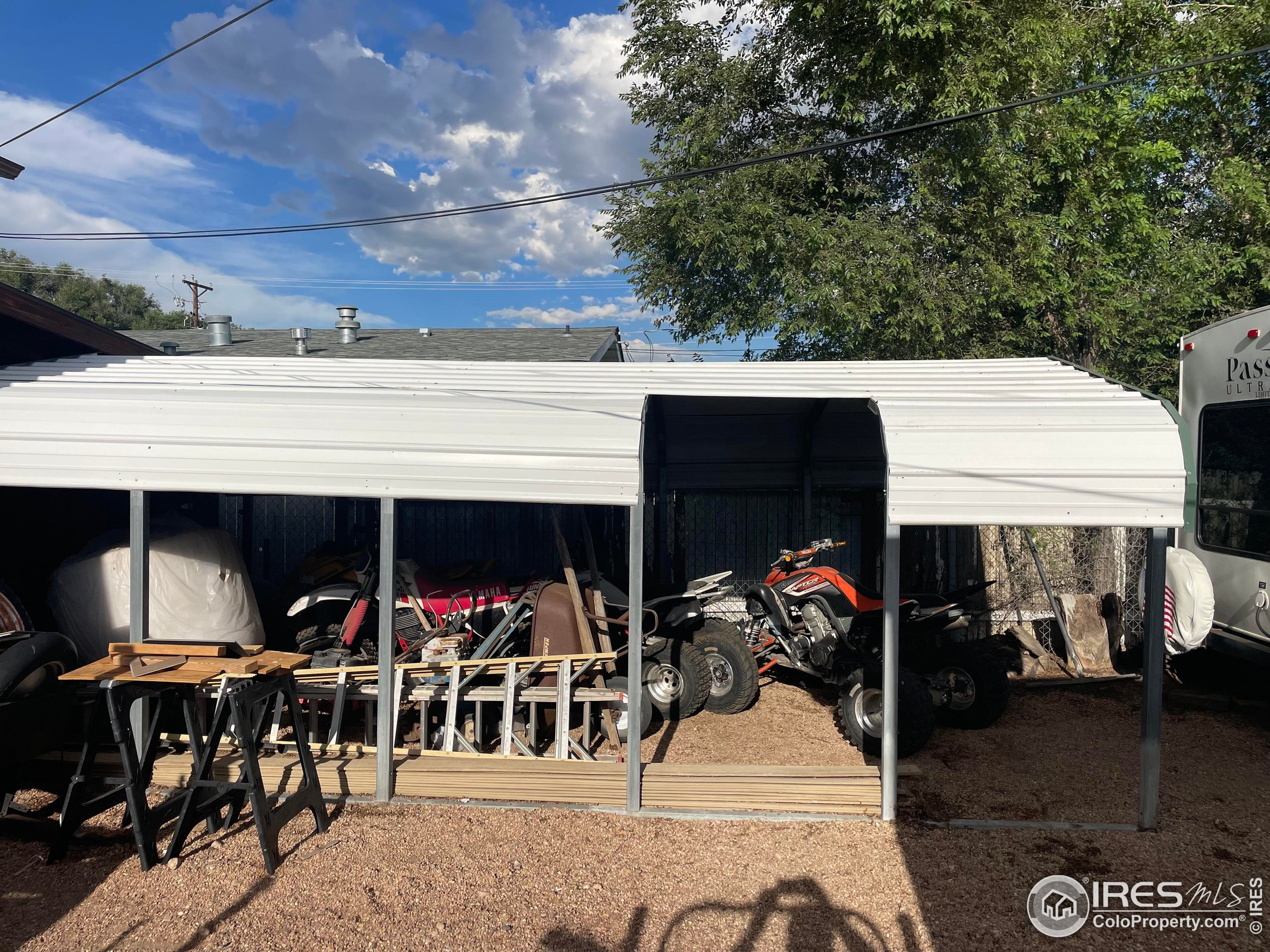 1004 1st Street Greeley, CO 80631 - Photo 6 of 27 a view of living room with furniture and a potted plant