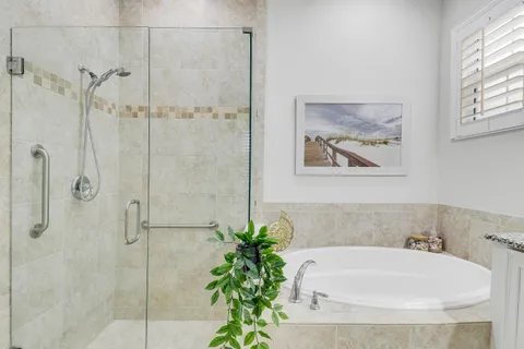a utility room with sink dryer and washer