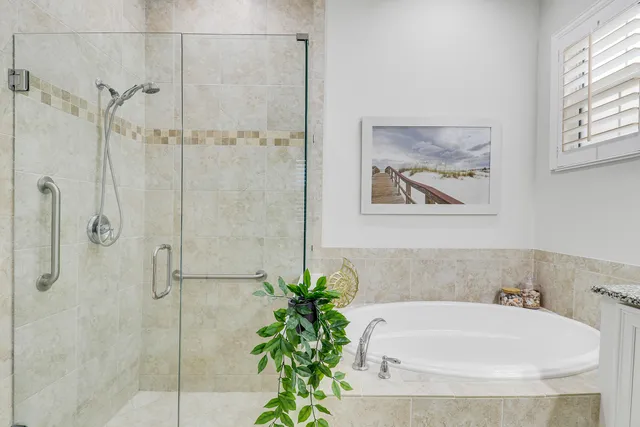 a utility room with sink dryer and washer