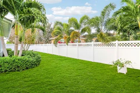 a view of a swimming pool with a garden