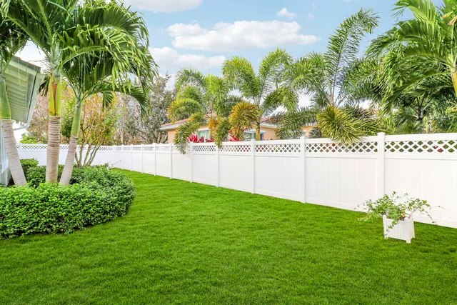 a view of a swimming pool with a garden