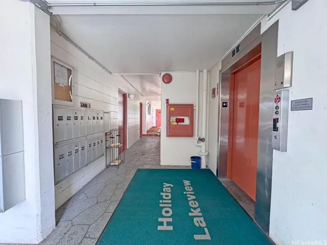 a hallway with cabinets