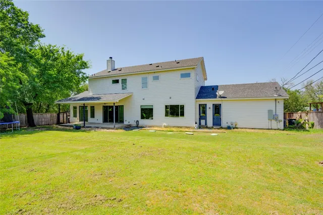 a kitchen that has a sink and a large window