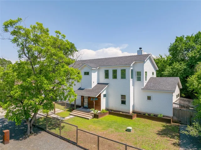 a view of a glass door with a yard