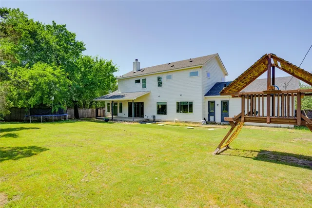 a view of a town with mountains