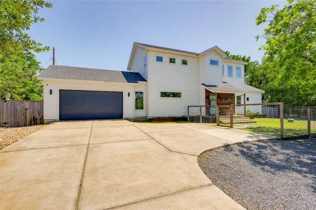 a house view with a backyard space