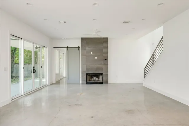 a view of a kitchen with a sink cabinets and a window