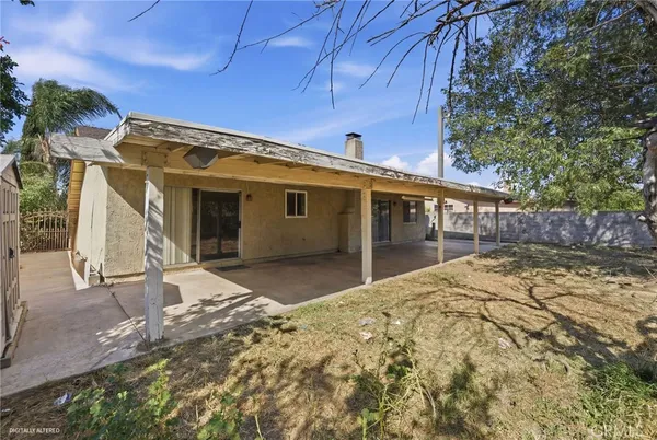 a view of a house with a patio