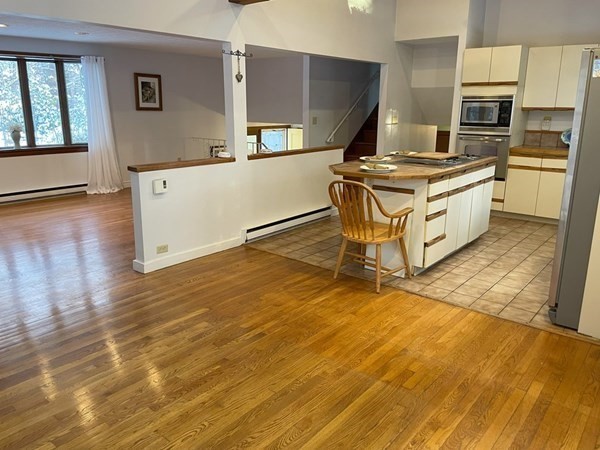 64 James Road Hanover, MA 02339 - Photo 12 of 40 a kitchen with stainless steel appliances a stove a sink and a refrigerator