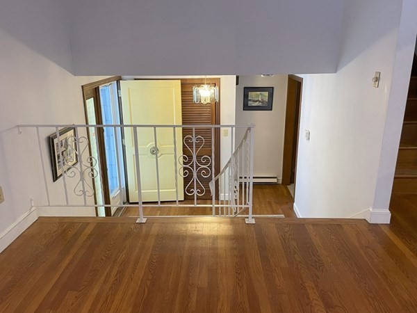 64 James Road Hanover, MA 02339 - Photo 16 of 40 a view of front door with wooden floor