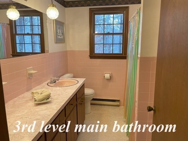 64 James Road Hanover, MA 02339 - Photo 18 of 40 a bathroom with a sink a toilet and shower