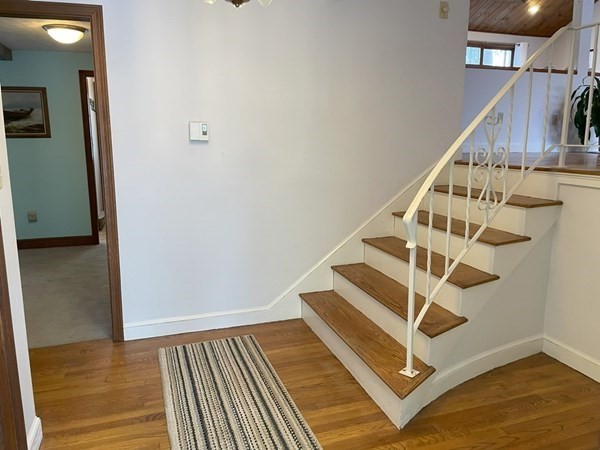 64 James Road Hanover, MA 02339 - Photo 2 of 40 a view of entryway with wooden floor