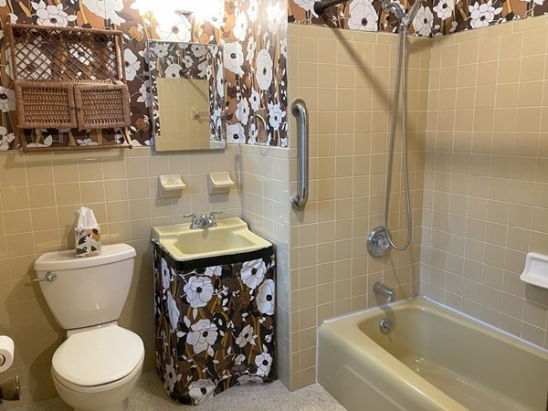 64 James Road Hanover, MA 02339 - Photo 22 of 40 a bathroom with a toilet sink and mirror