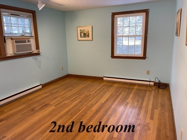 64 James Road Hanover, MA 02339 - Photo 23 of 40 a view of a room with wooden floor and windows