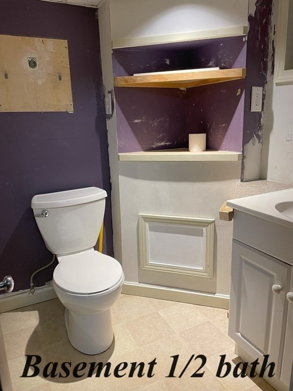 64 James Road Hanover, MA 02339 - Photo 30 of 40 a bathroom with a toilet and a sink