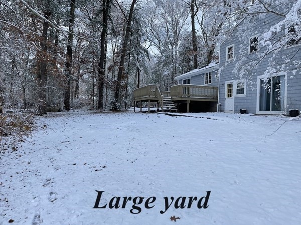64 James Road Hanover, MA 02339 - Photo 35 of 40 a view of a house with a snow in the yard