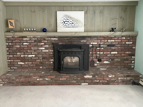 64 James Road Hanover, MA 02339 - Photo 4 of 40 a closeup of a sink and a fireplace