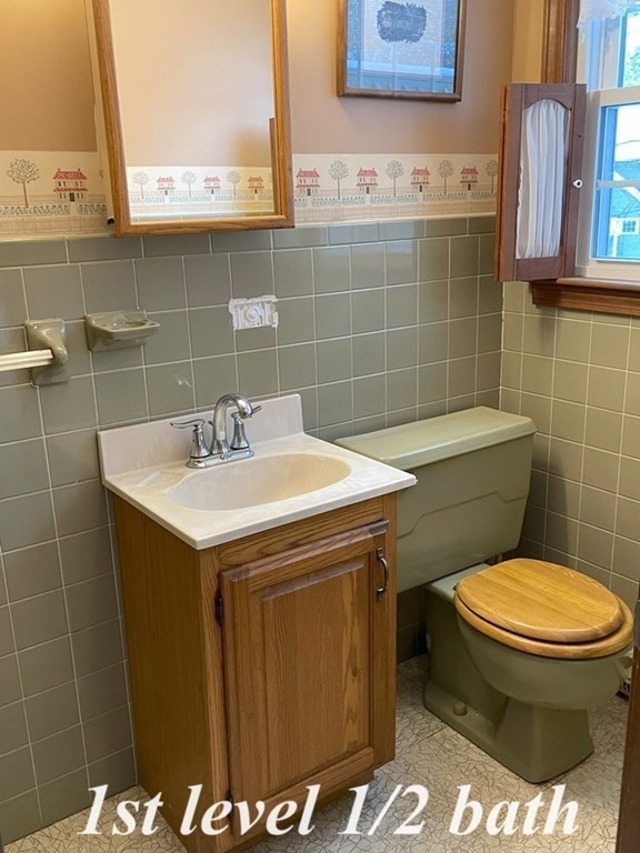64 James Road Hanover, MA 02339 - Photo 7 of 40 a bathroom with a sink a toilet and a mirror