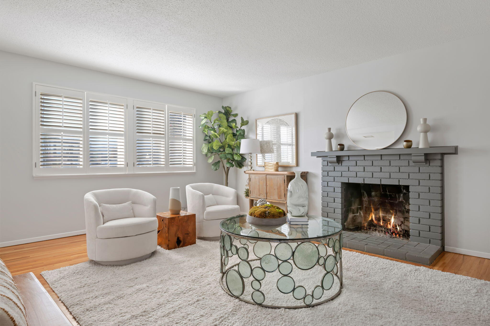 52 Deerhurst Drive Goleta, CA 93117 - Photo 3 of 18 a living room with furniture and a fireplace