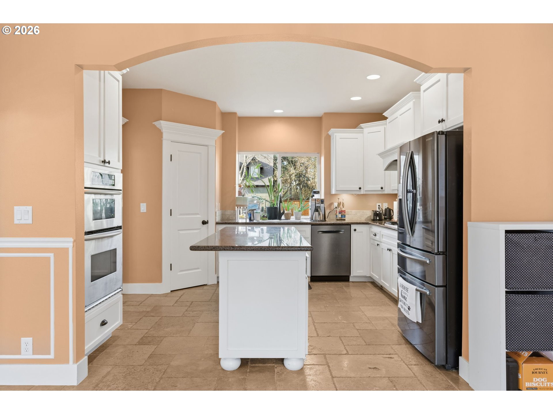 475 Salty Way Eugene, OR 97404 - Photo 19 of 48 a kitchen with kitchen island a counter top space a sink stainless steel appliances and cabinets