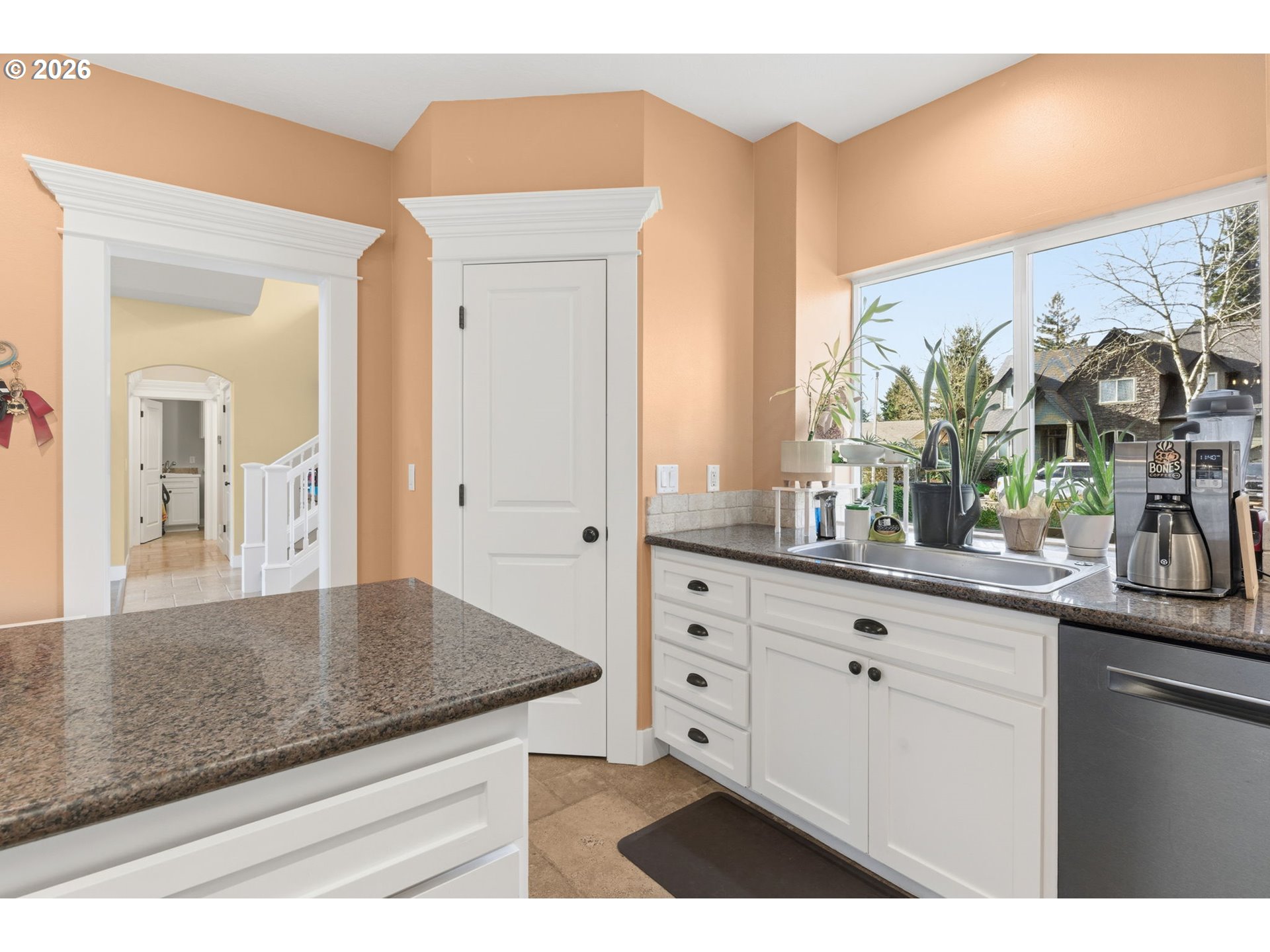475 Salty Way Eugene, OR 97404 - Photo 22 of 48 a kitchen with granite countertop a sink and cabinets