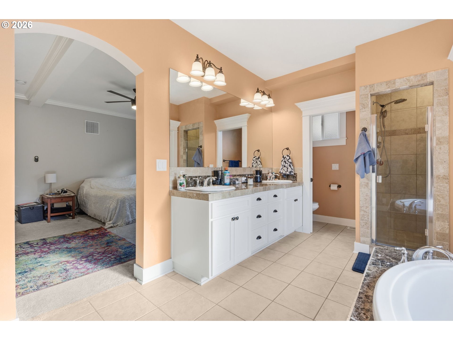 475 Salty Way Eugene, OR 97404 - Photo 27 of 48 a bathroom with a double vanity sink mirror and shower
