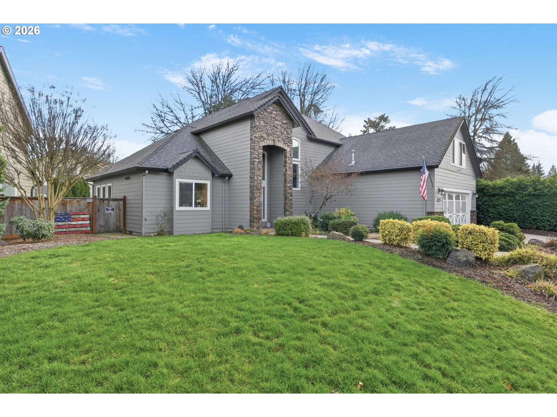 475 Salty Way Eugene, OR 97404 - Photo 5 of 48 a view of a house with yard and a garden