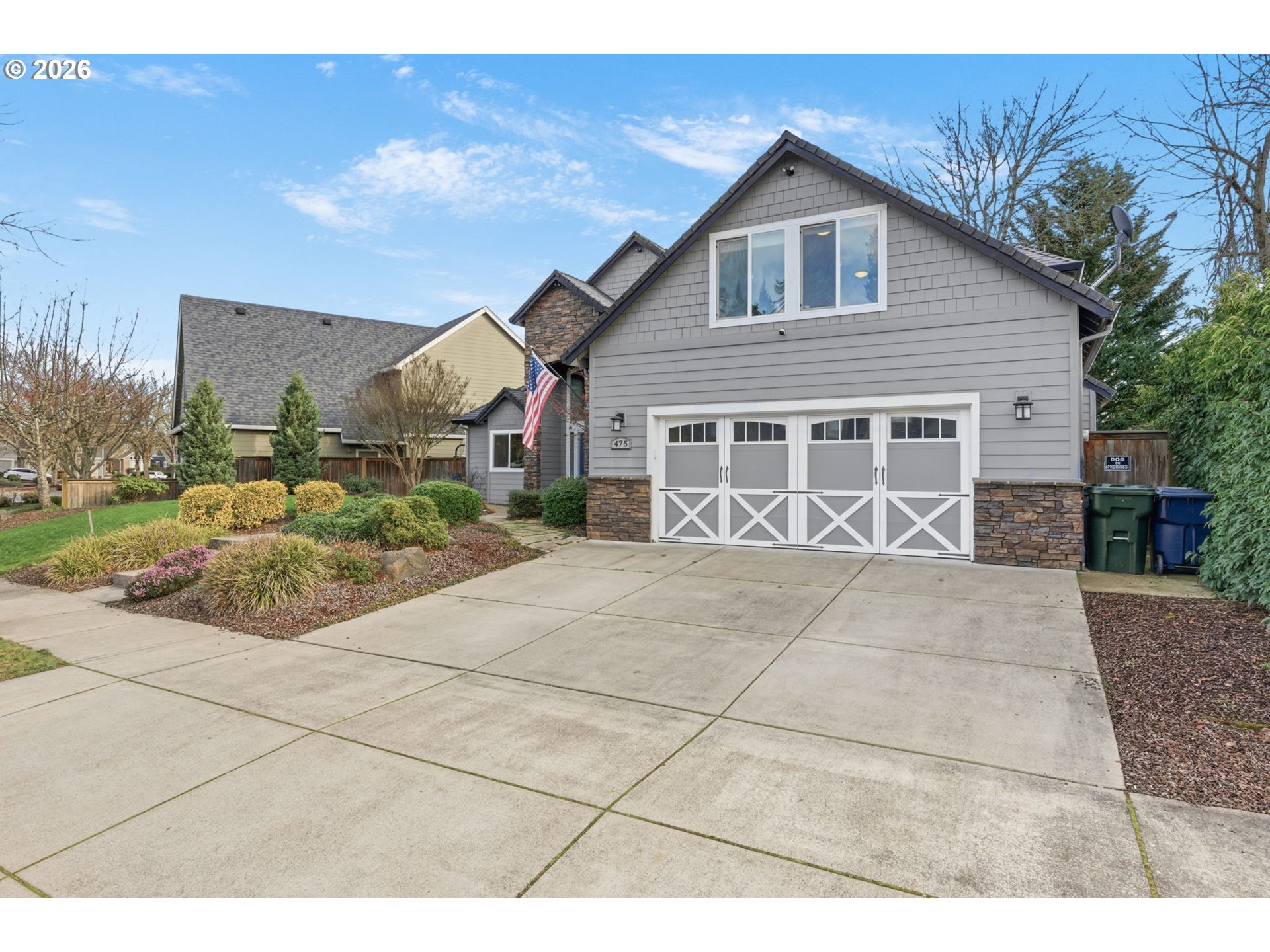 475 Salty Way Eugene, OR 97404 - Photo 7 of 48 a front view of a house with a yard and garage