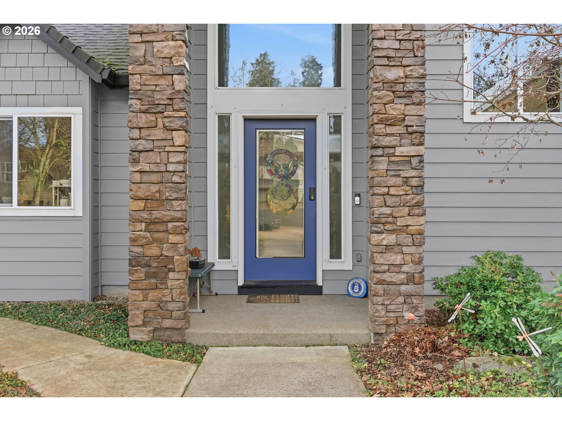 475 Salty Way Eugene, OR 97404 - Photo 9 of 48 a front view of a house with a garden