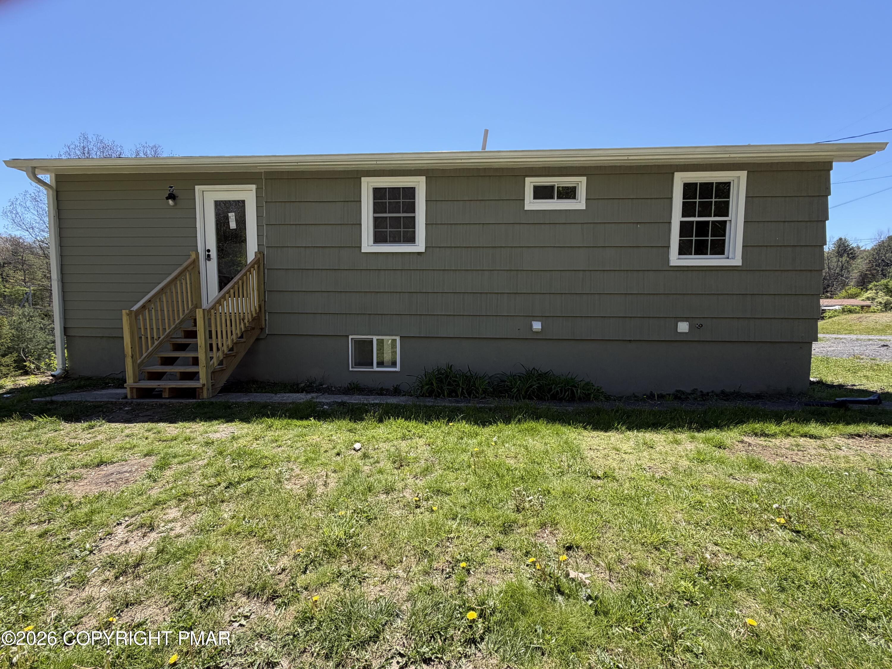 108 Spruce Lane, Unit 108 Bushkill, PA 18324 - Photo 3 of 12 Back Entrance