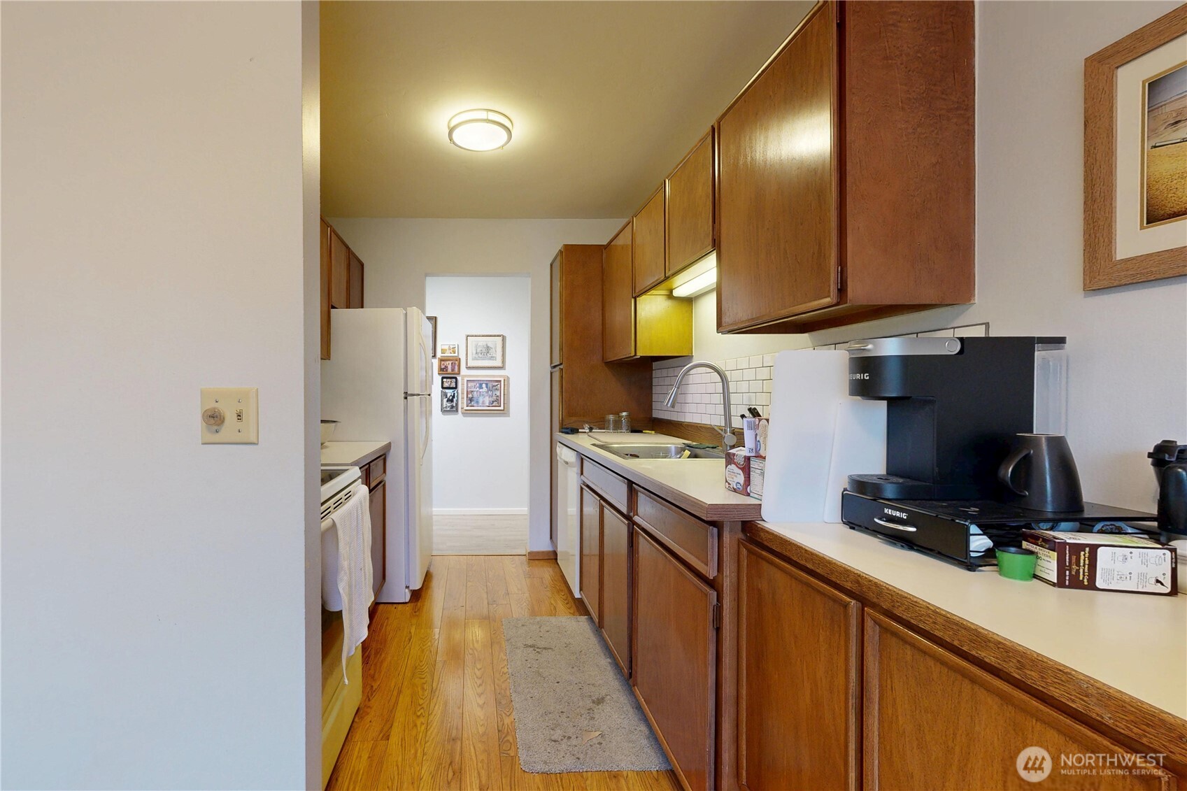 364 Catherine Street, Unit B6 Walla Walla, WA 99362 - Photo 13 of 26 a kitchen with stainless steel appliances granite countertop a refrigerator a stove and a sink