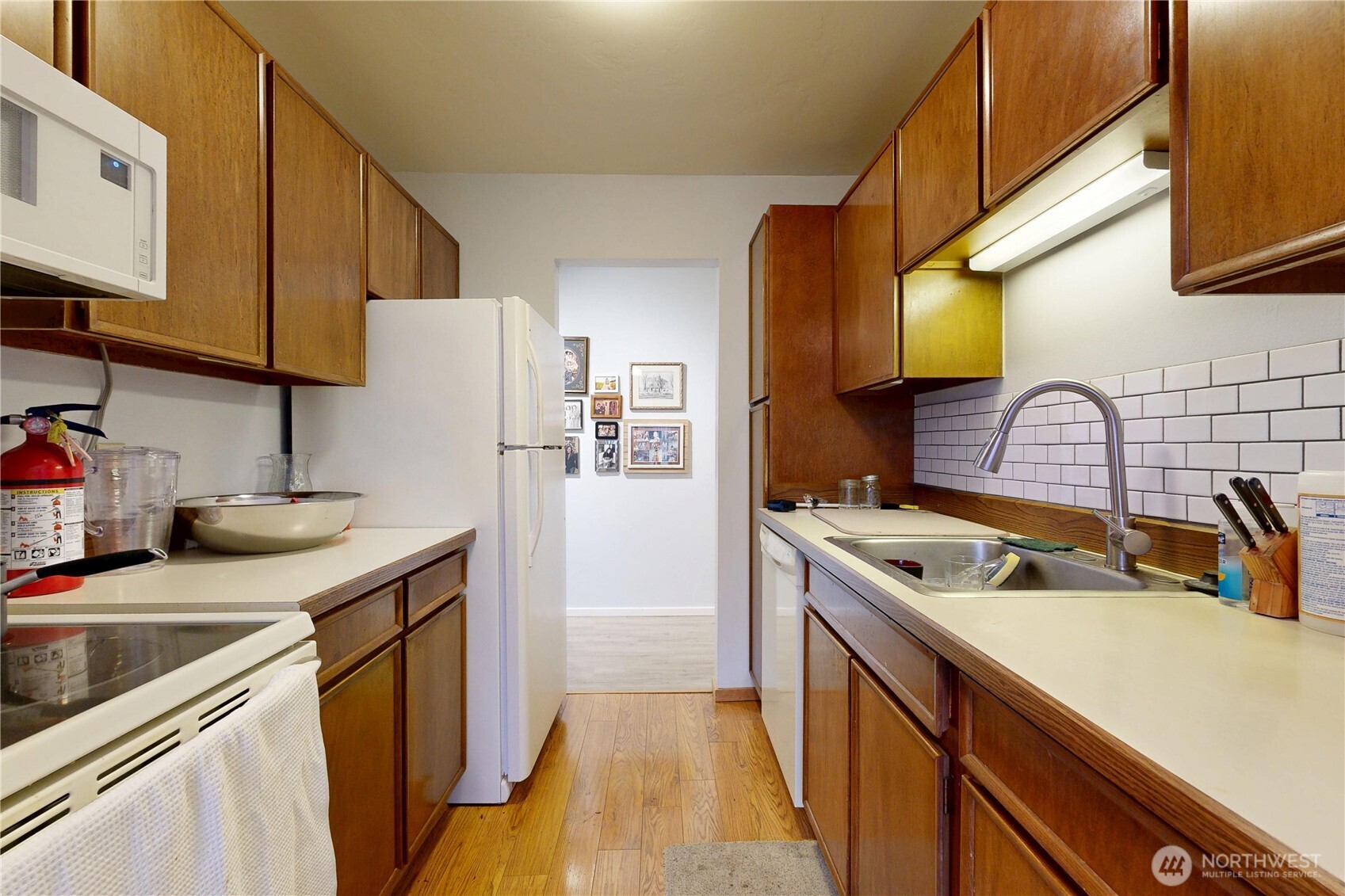 364 Catherine Street, Unit B6 Walla Walla, WA 99362 - Photo 14 of 26 a kitchen with a sink stove and refrigerator
