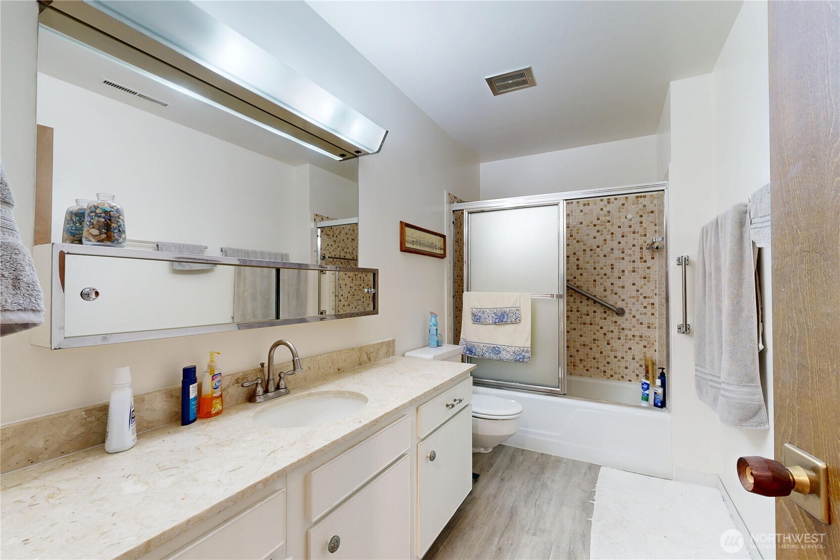 364 Catherine Street, Unit B6 Walla Walla, WA 99362 - Photo 18 of 26 a bathroom with a double vanity sink mirror and shower