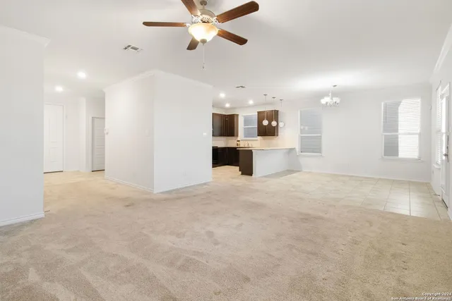 a view of a kitchen and a window