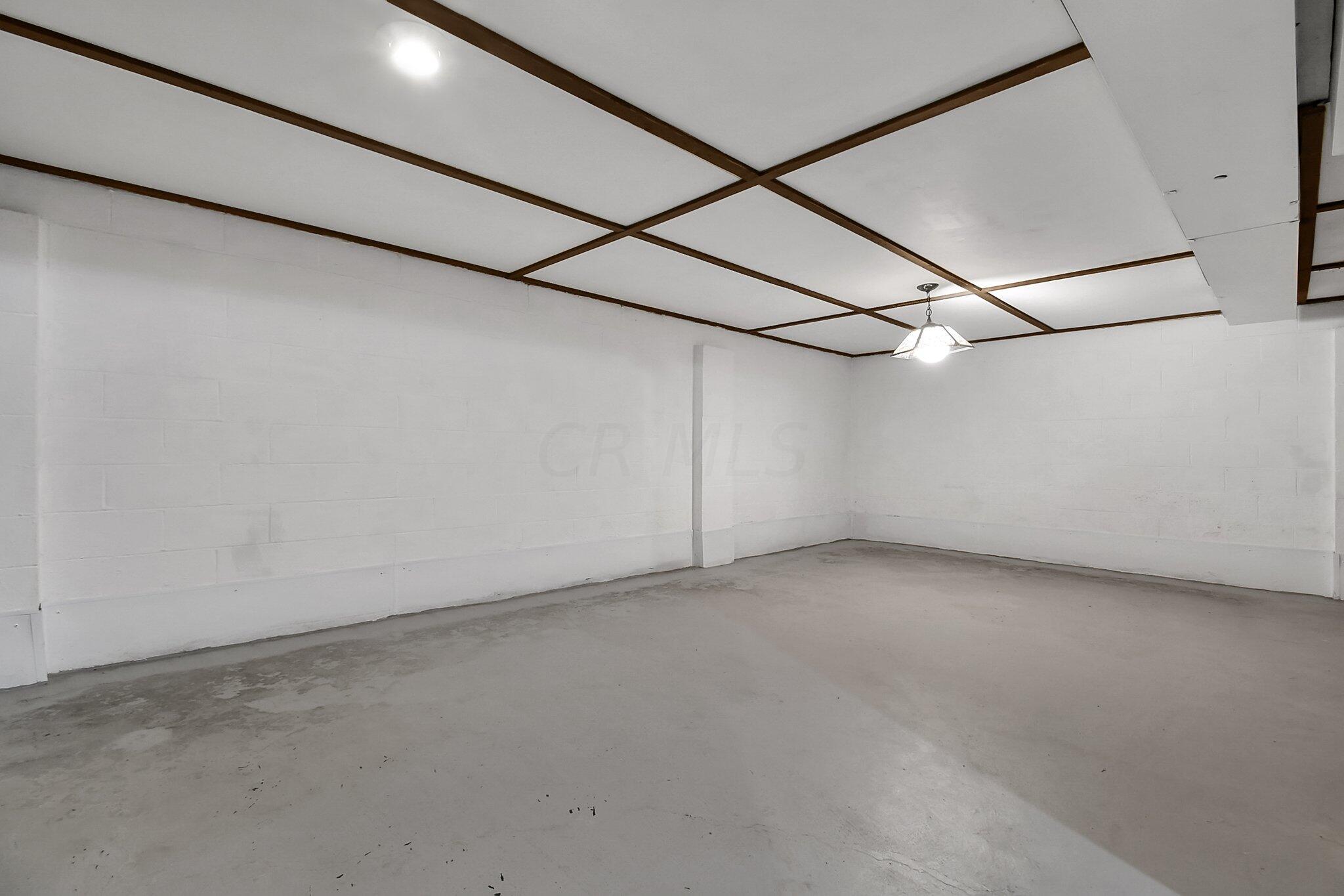 429 Amity Road Galloway, OH 43119 - Photo 20 of 27 partially finished/ceiling. Floor painted/walls painted/clean/move in condition.