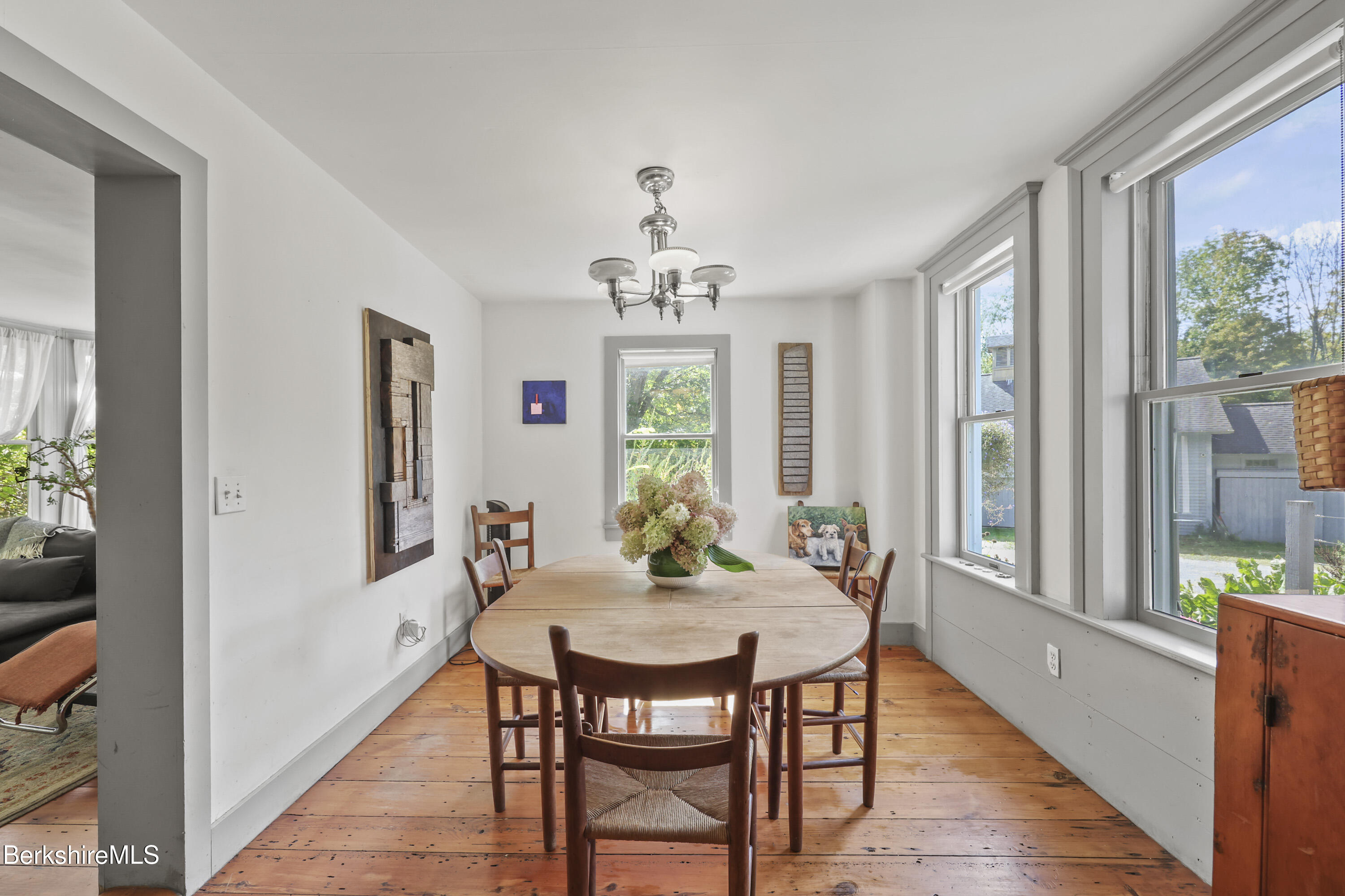 276 Great Barrington Road West Stockbridge, MA 01236 - Photo 15 of 68 a dining room with furniture a rug and a chandelier