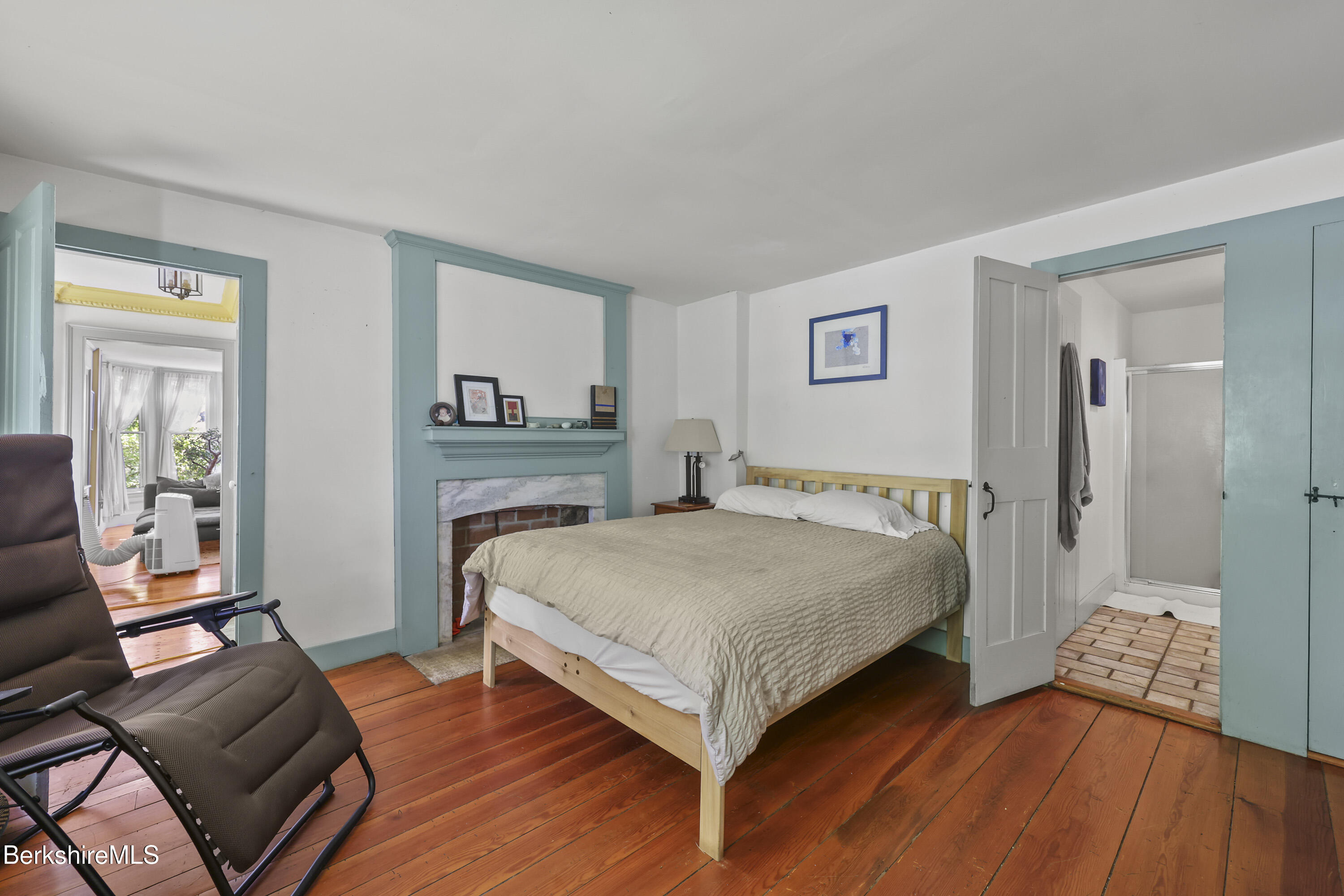 276 Great Barrington Road West Stockbridge, MA 01236 - Photo 21 of 68 a bedroom with a bed and wooden floor
