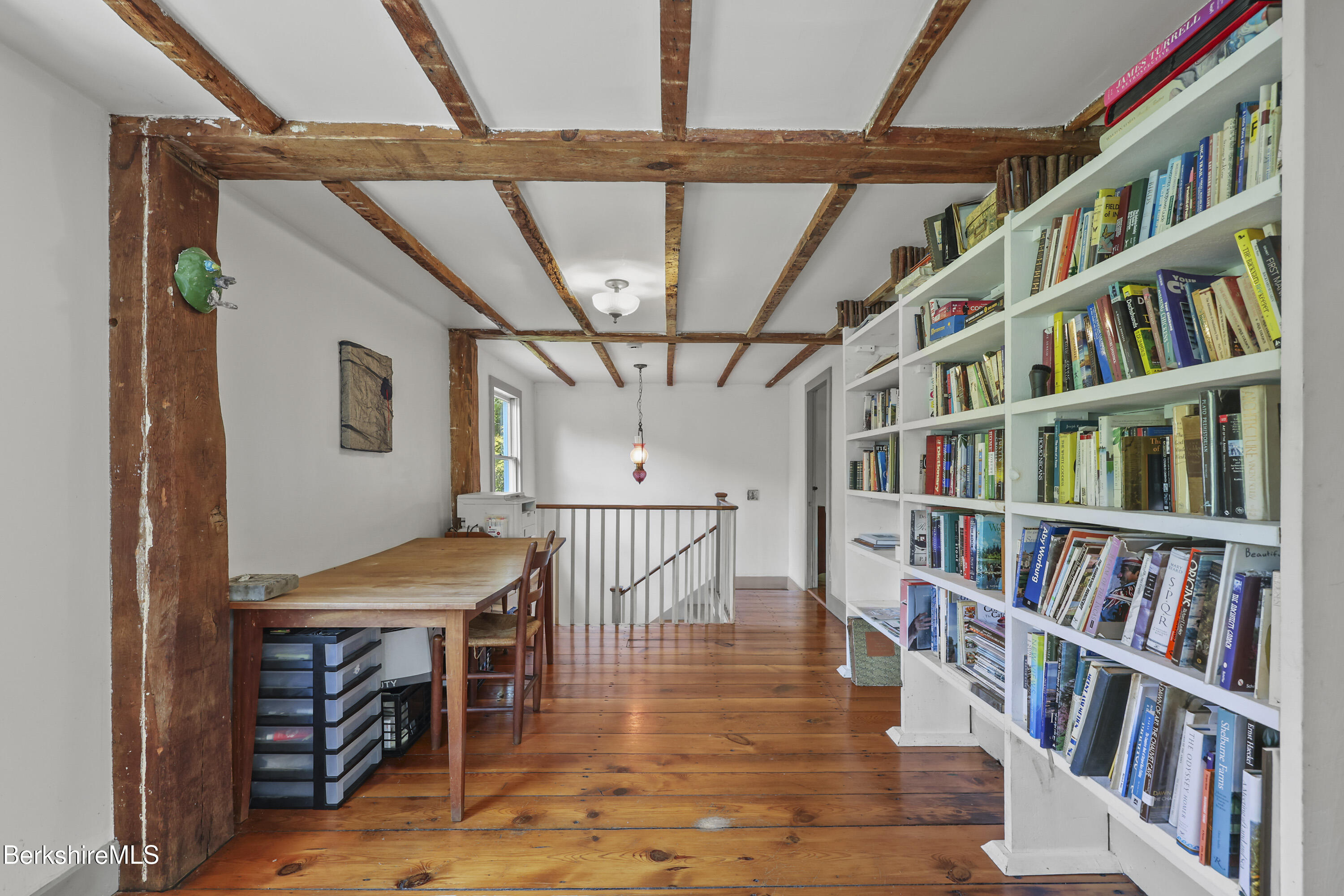 276 Great Barrington Road West Stockbridge, MA 01236 - Photo 26 of 68 a dining room with furniture and a book shelf